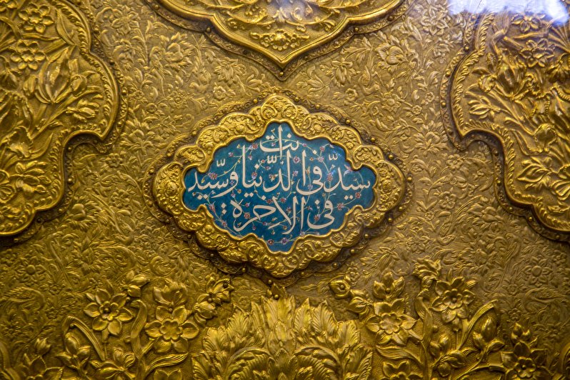 gilding of the entrance door of the holy shrine of Amir Al-Momenin (piece be upon him)