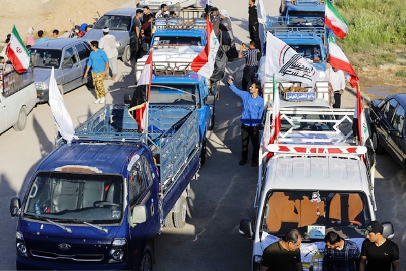 نیرو‌های بسیج مردمی عراق در کنار مردم سیل‌زده ایران هستند